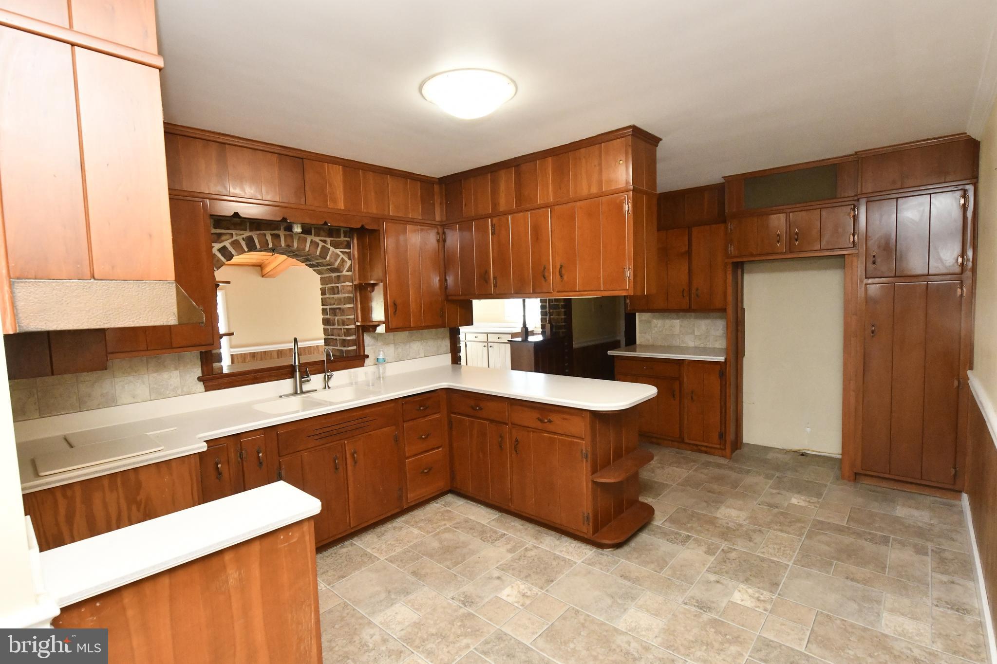 325 May Post Strasburg, PA 17579 - Photo 3 of 22 a kitchen with stainless steel appliances granite countertop a sink and a refrigerator