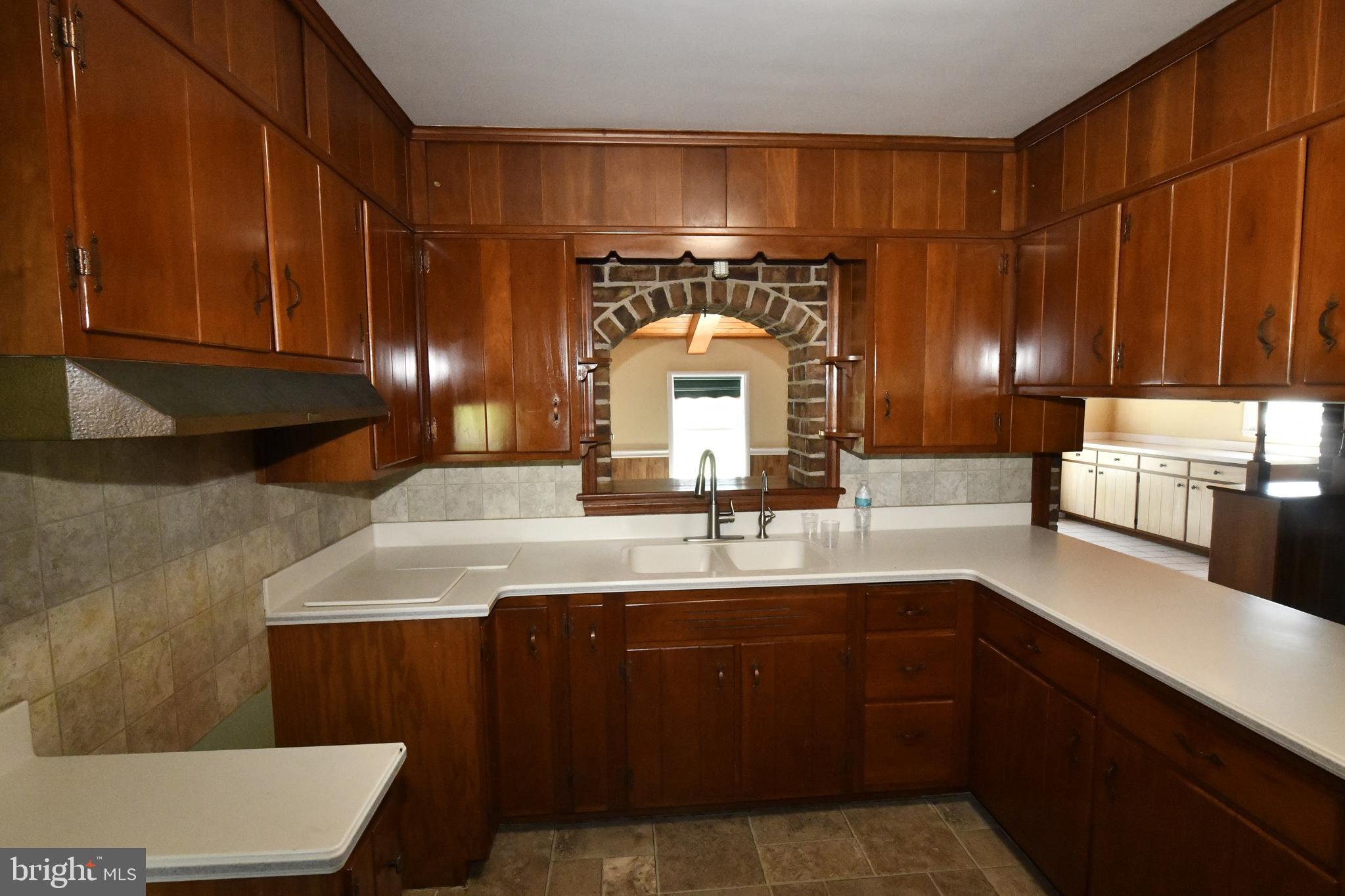 325 May Post Strasburg, PA 17579 - Photo 4 of 22 a kitchen with a sink a counter space and cabinets