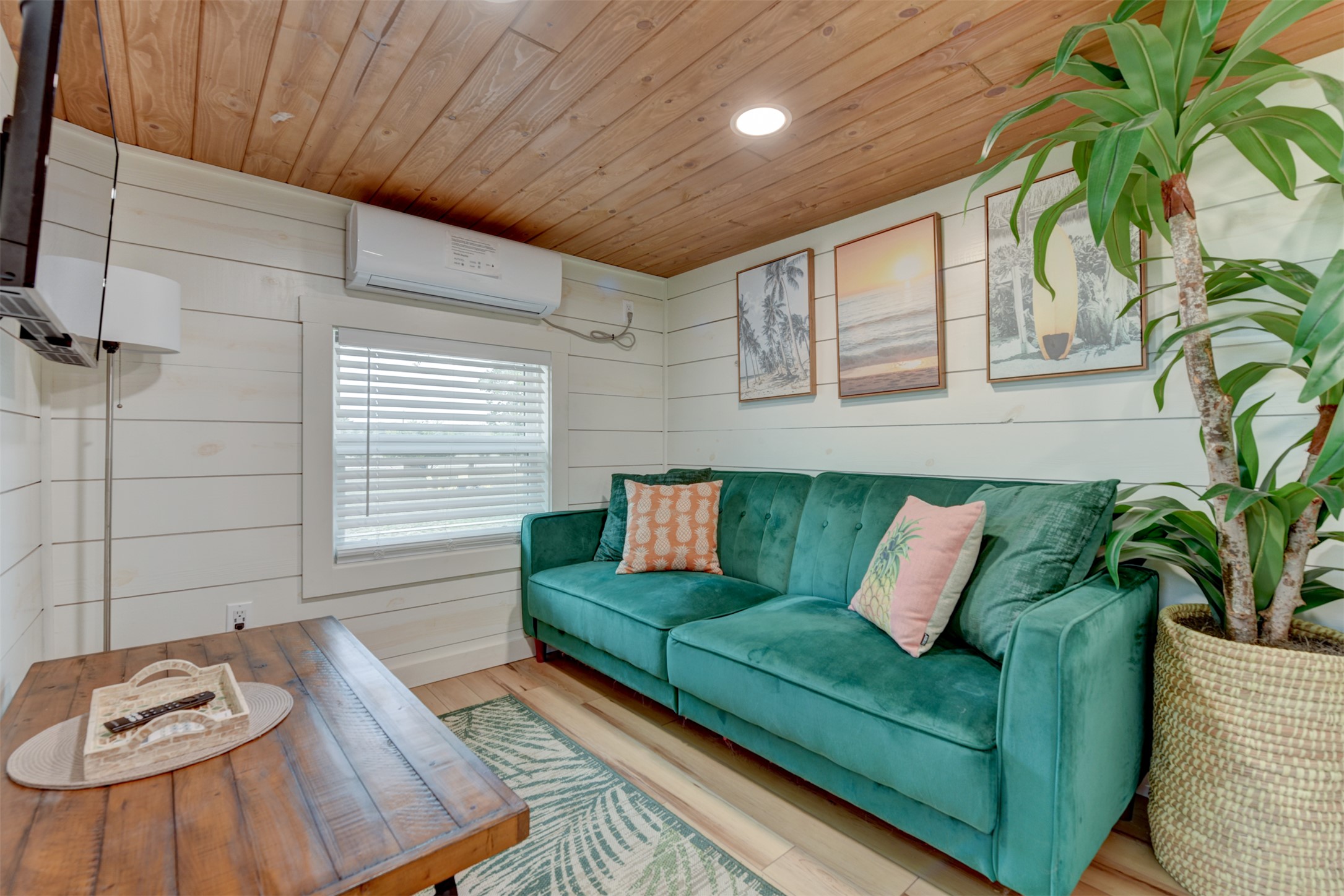 1156 Narrows Road Blanco, TX 78606 - Photo 17 of 40 Living area featuring a natural wood-finish plank ceiling and white shiplap walls