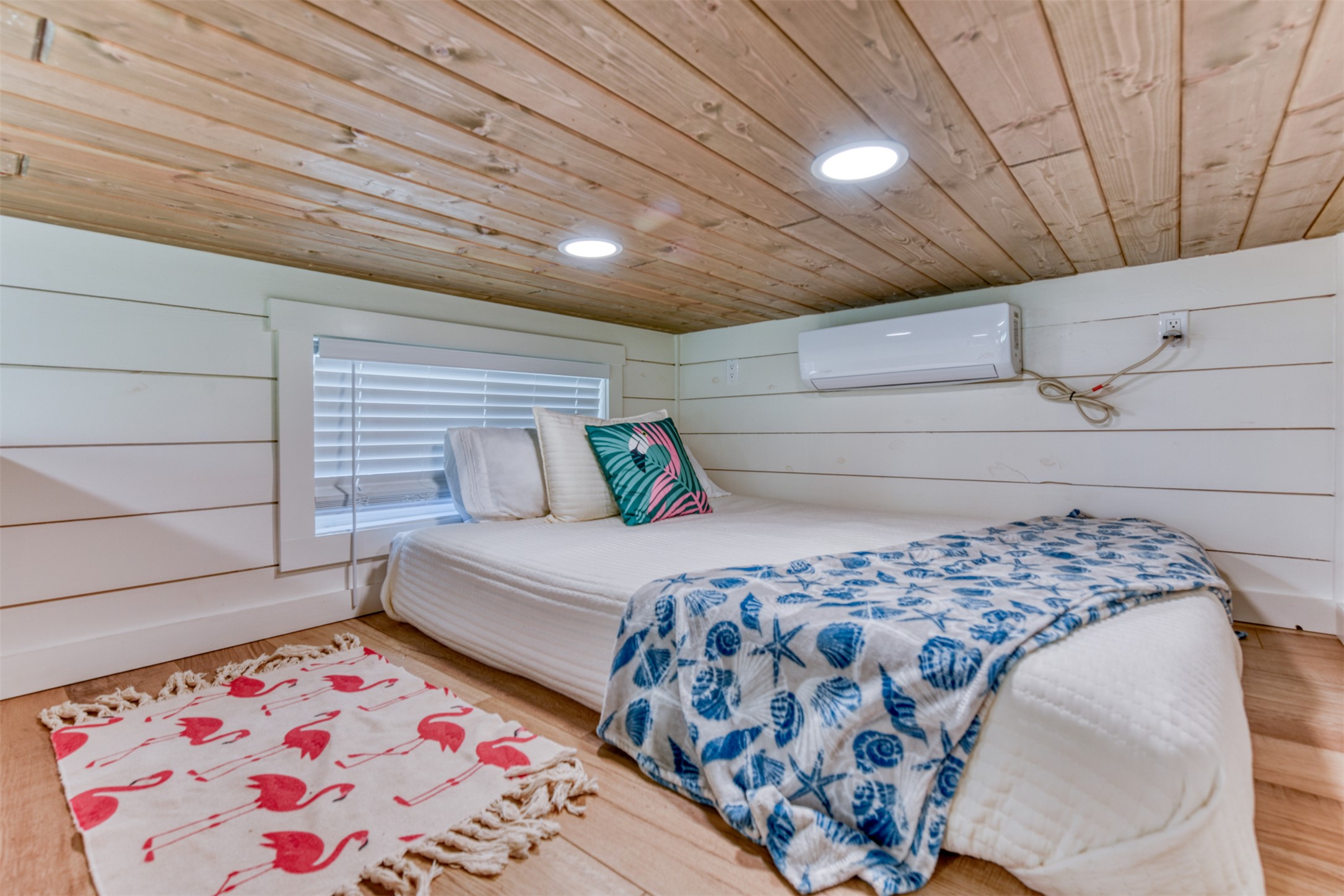 1156 Narrows Road Blanco, TX 78606 - Photo 35 of 40 Loft space featuring wood-finish flooring and a wood-paneled ceiling with recessed lighting
