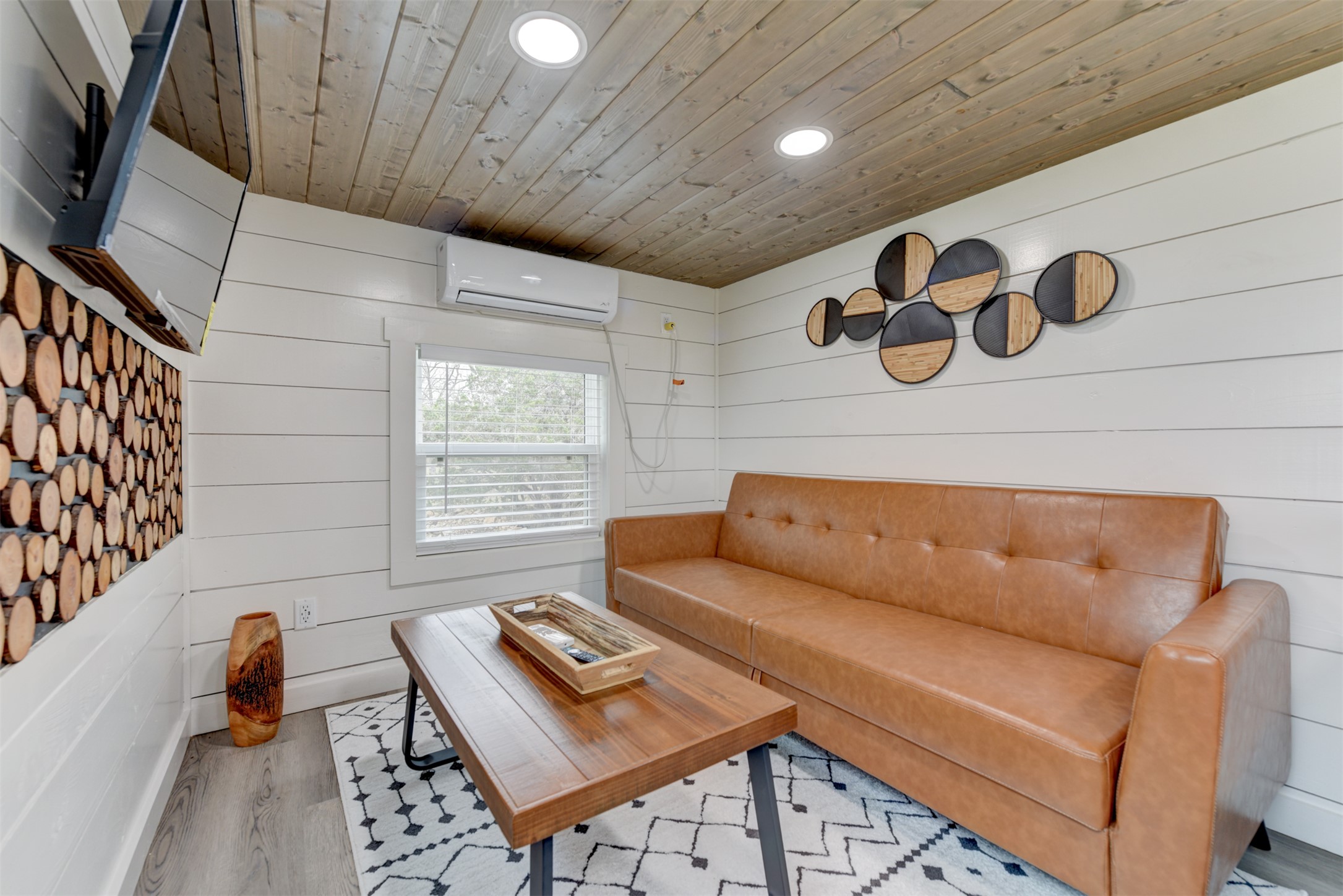 1156 Narrows Road Blanco, TX 78606 - Photo 7 of 40 Interior room featuring wood-finish ceiling, white shiplap walls, recessed lighting, and wood-finish flooring