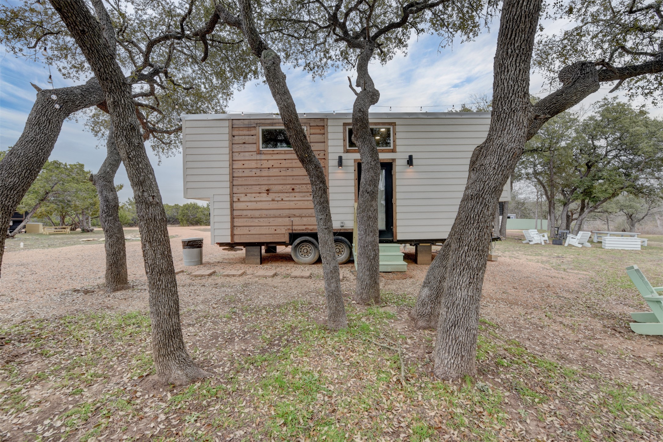 1156 Narrows Road Blanco, TX 78606 - Photo 10 of 40 Modern tiny home with light-toned siding and natural wood accents