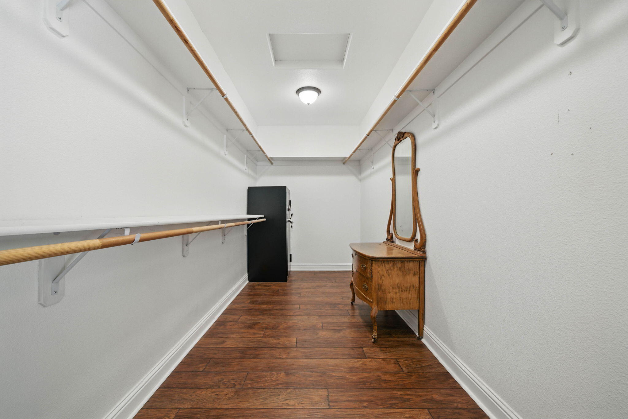 15399 Star Flower Road Oak Run, CA 96069 - Photo 19 of 44 a hallway with wooden floor and staircase