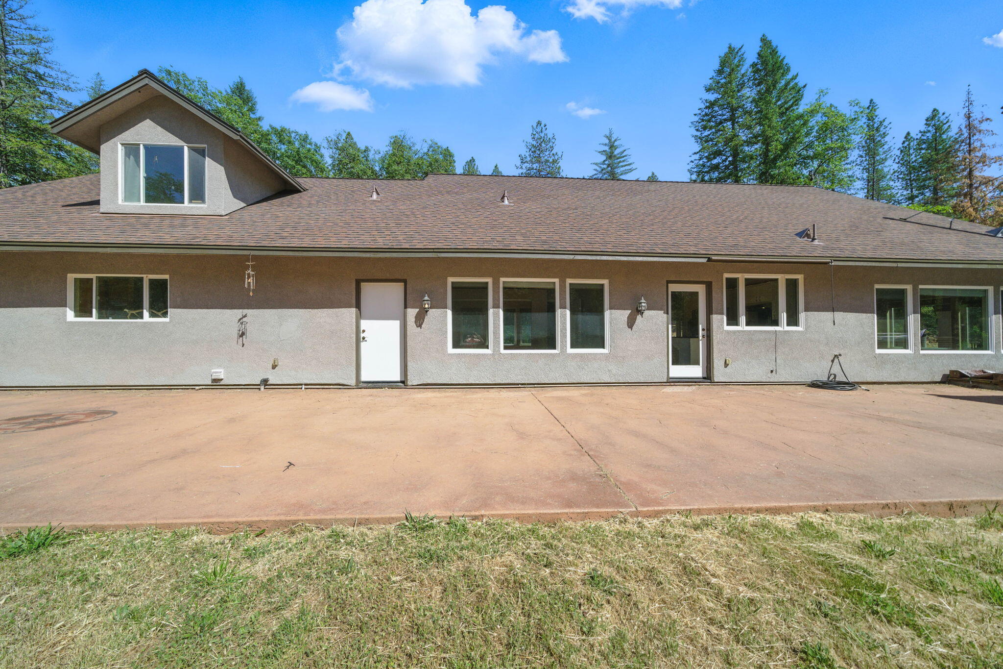 15399 Star Flower Road Oak Run, CA 96069 - Photo 25 of 44 front view of a house with a yard