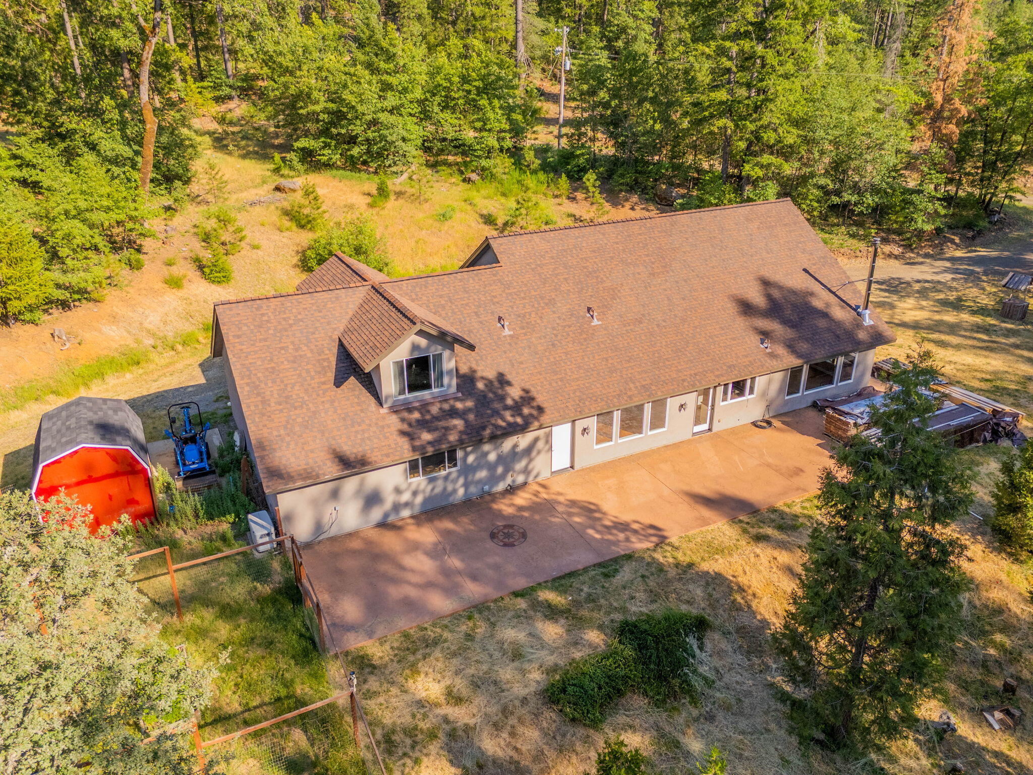 15399 Star Flower Road Oak Run, CA 96069 - Photo 41 of 44 an aerial view of a house with swimming pool and