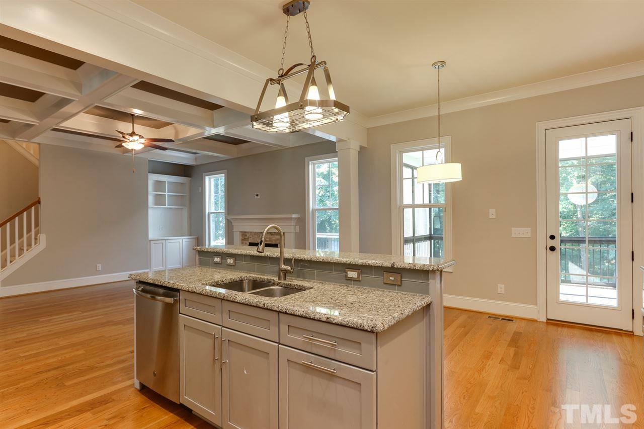 1103 Temple Street Raleigh, NC 27609 - Photo 12 of 30 Large kitchen island with raised bar seating