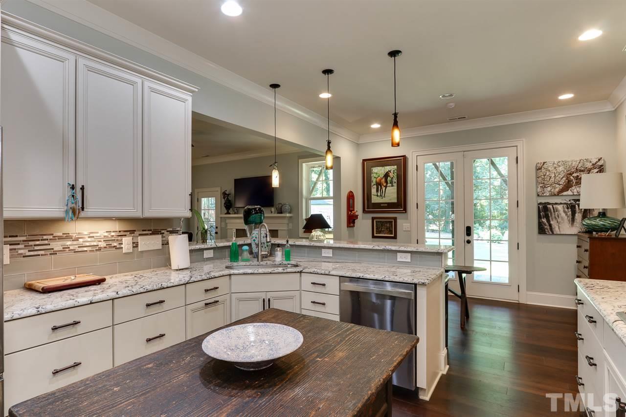 1103 Temple Street Raleigh, NC 27609 - Photo 18 of 30 Lower Level Kitchen is open to the family room