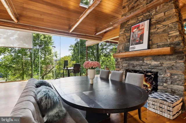a outdoor dining space with furniture and outdoor view