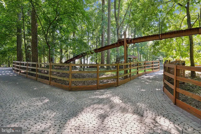 a view of outdoor space with deck and trees