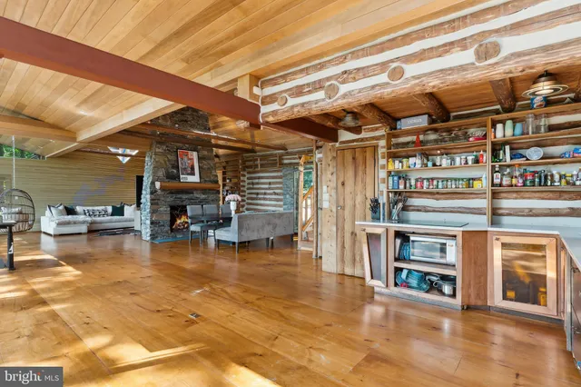 a view of a studio with wooden floor