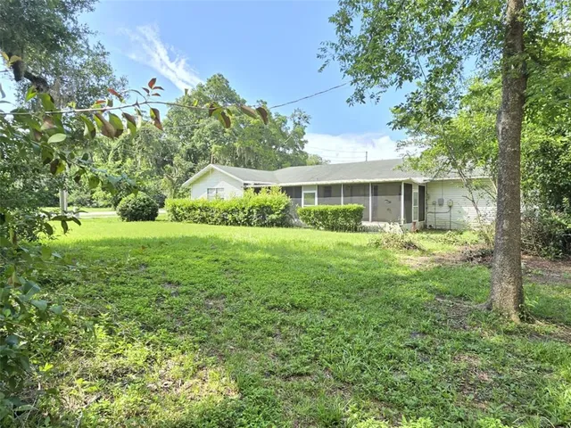 a house view with a garden space