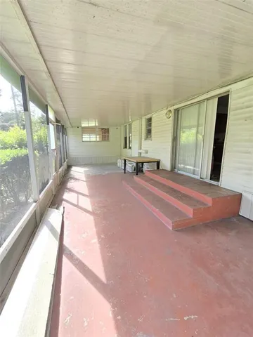 a view of a chairs in an empty room