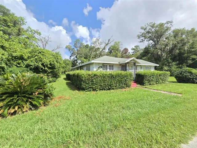a house view with a garden space