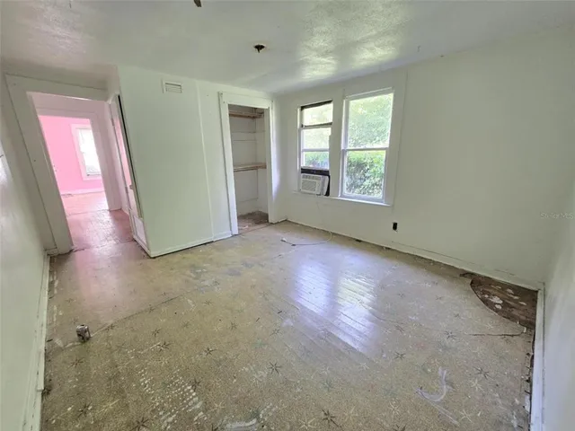 an empty room with windows