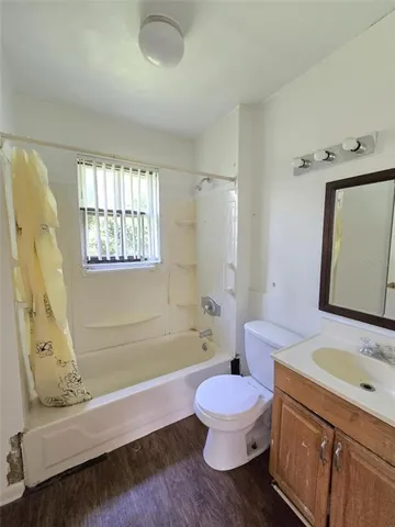a bathroom with a sink a bathtub and a toilet