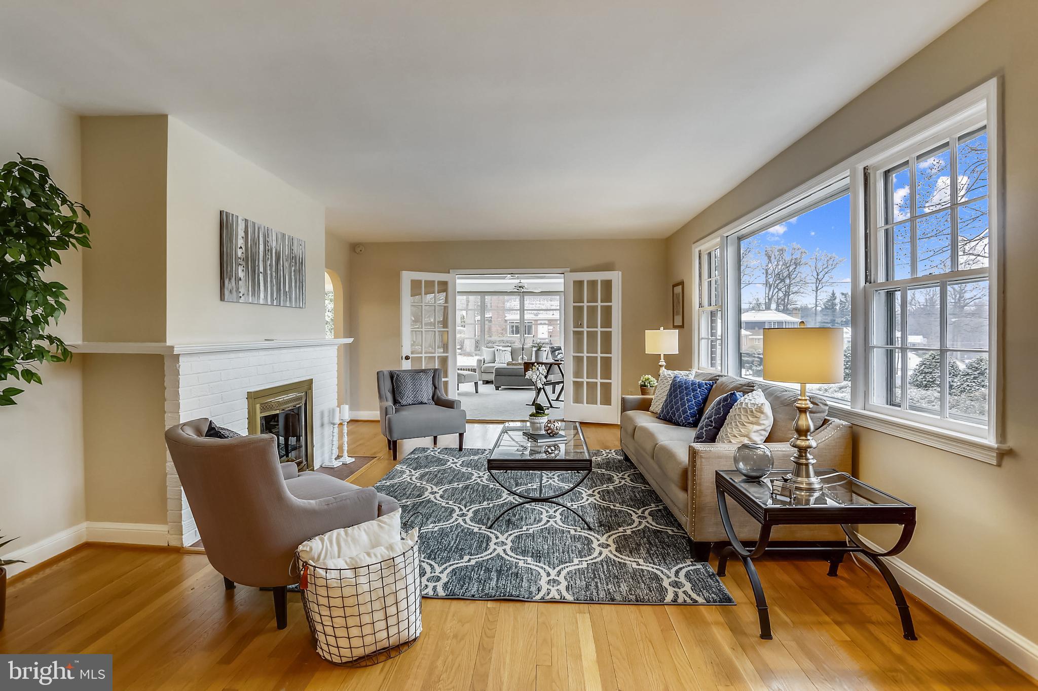 9802 Dameron Drive Silver Spring, MD 20902 - Photo 8 of 37 Living room opens to sun room and dining room