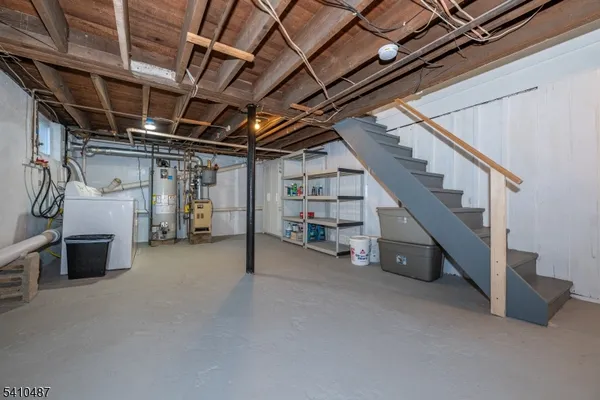 a view of empty room with white walls