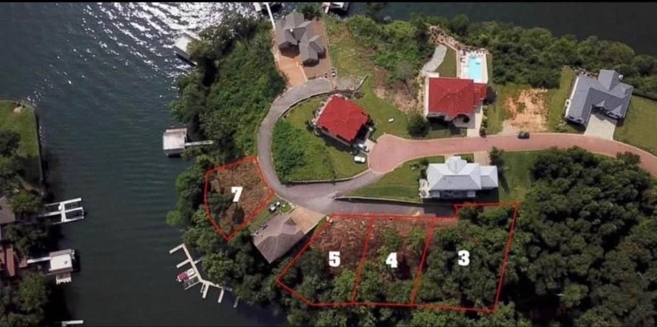 Pinnacle Pointe Point Savannah, TN 38372 - Photo 3 of 4 Aerial overview of property's location with a large body of water and property boundaries highlighted