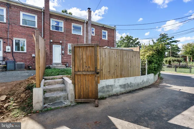 a view of a hallway with seating area