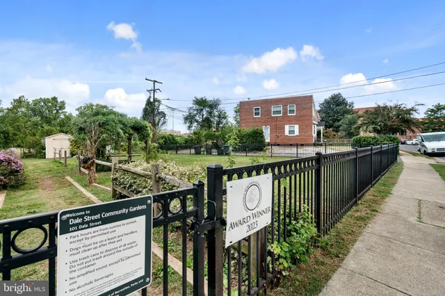 a view of outdoor space with seating area and trees around