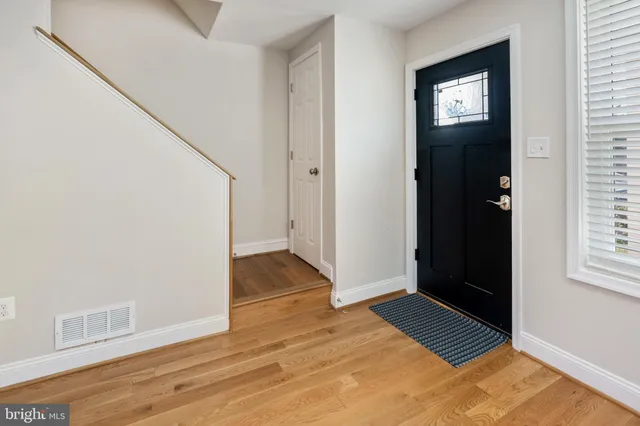 a view of a hallway with washer and dryer