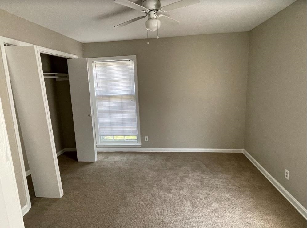 4875 Knight Arnold Road Memphis, TN 38118 - Photo 11 of 16 an empty room with a window