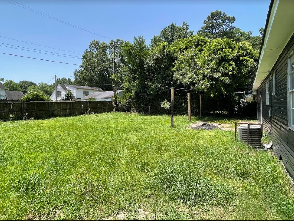 4875 Knight Arnold Road Memphis, TN 38118 - Photo 15 of 16 a view of a backyard with a garden