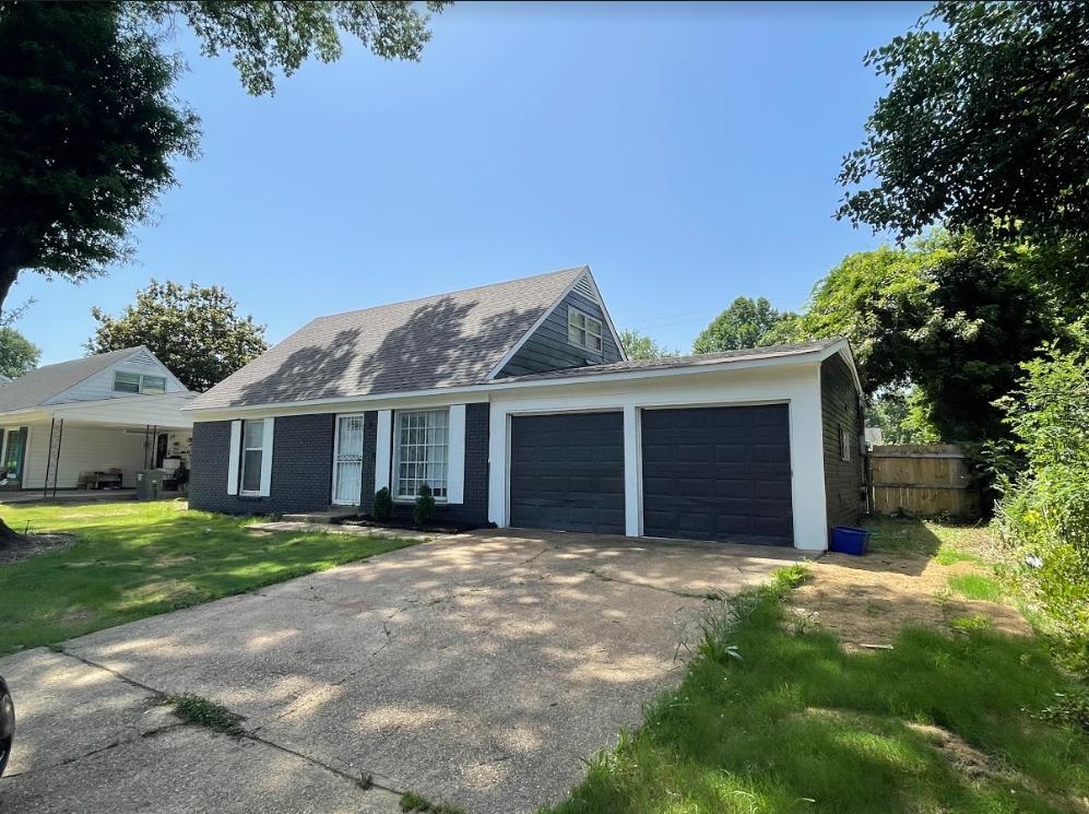 4875 Knight Arnold Road Memphis, TN 38118 - Photo 2 of 16 a view of a house with a yard