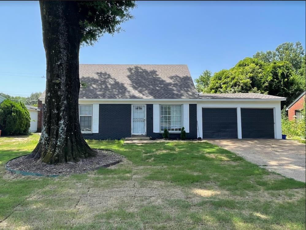 4875 Knight Arnold Road Memphis, TN 38118 - Photo 3 of 16 a backyard of a house with seating space