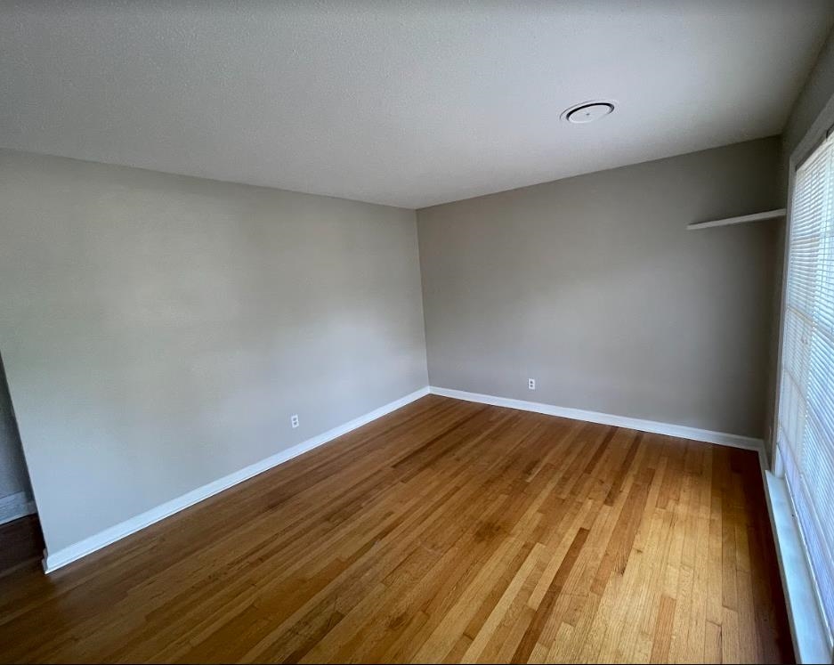 4875 Knight Arnold Road Memphis, TN 38118 - Photo 4 of 16 a view of wooden floor in a room