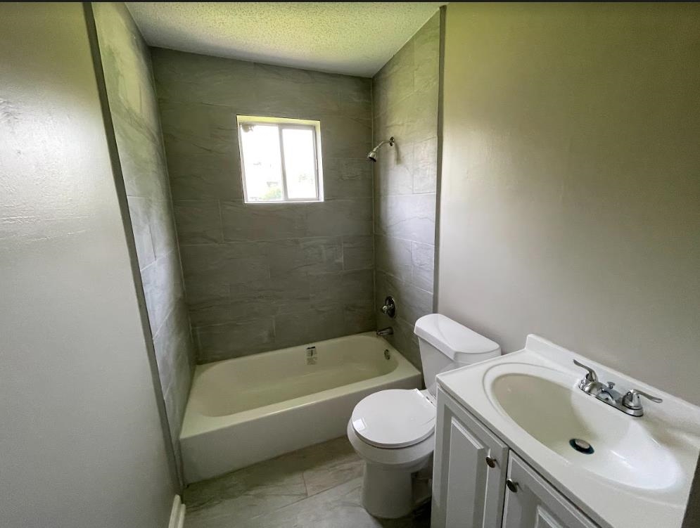 4875 Knight Arnold Road Memphis, TN 38118 - Photo 8 of 16 a bathroom with a sink toilet and shower