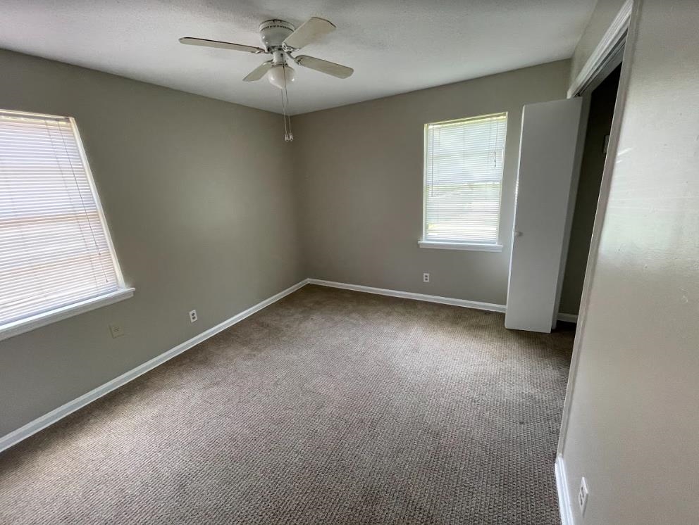 4875 Knight Arnold Road Memphis, TN 38118 - Photo 9 of 16 an empty room with a window