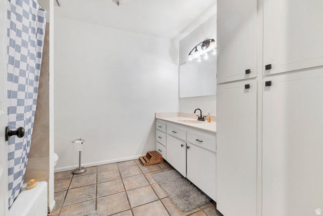3334 Ute Road St. George, UT 84790 - Photo 14 of 40 Bathroom featuring vanity and light tile patterned flooring