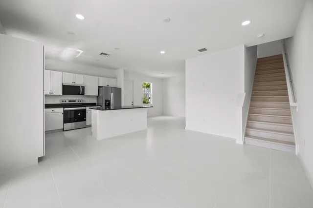 a bathroom with a sink a mirror and a toilet