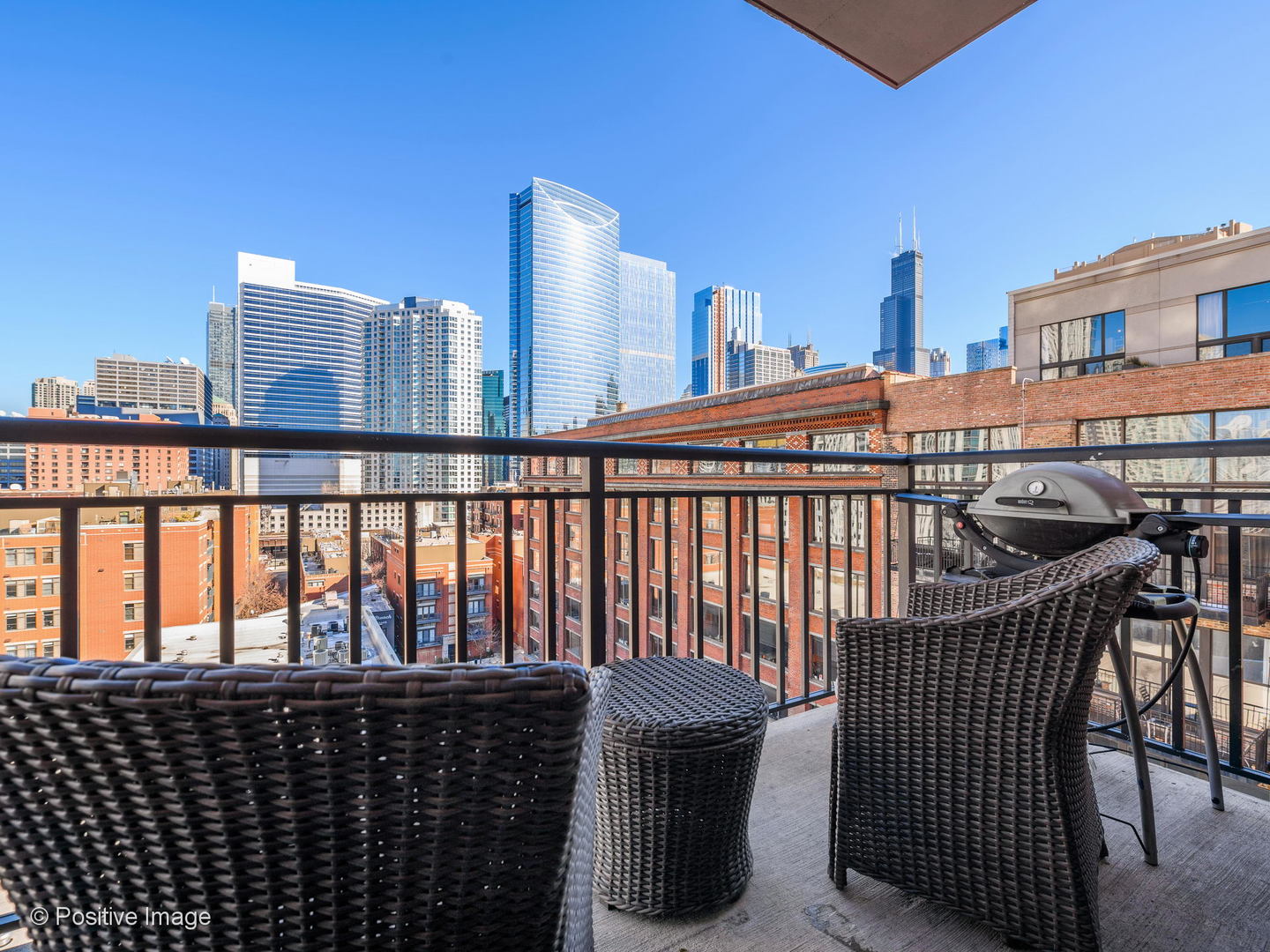330 North Jefferson Street, Unit 904 Chicago, IL 60661 - Photo 12 of 27 a view of city from a balcony