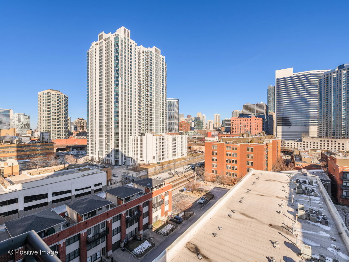 330 North Jefferson Street, Unit 904 Chicago, IL 60661 - Photo 14 of 27 a view of a city with tall buildings