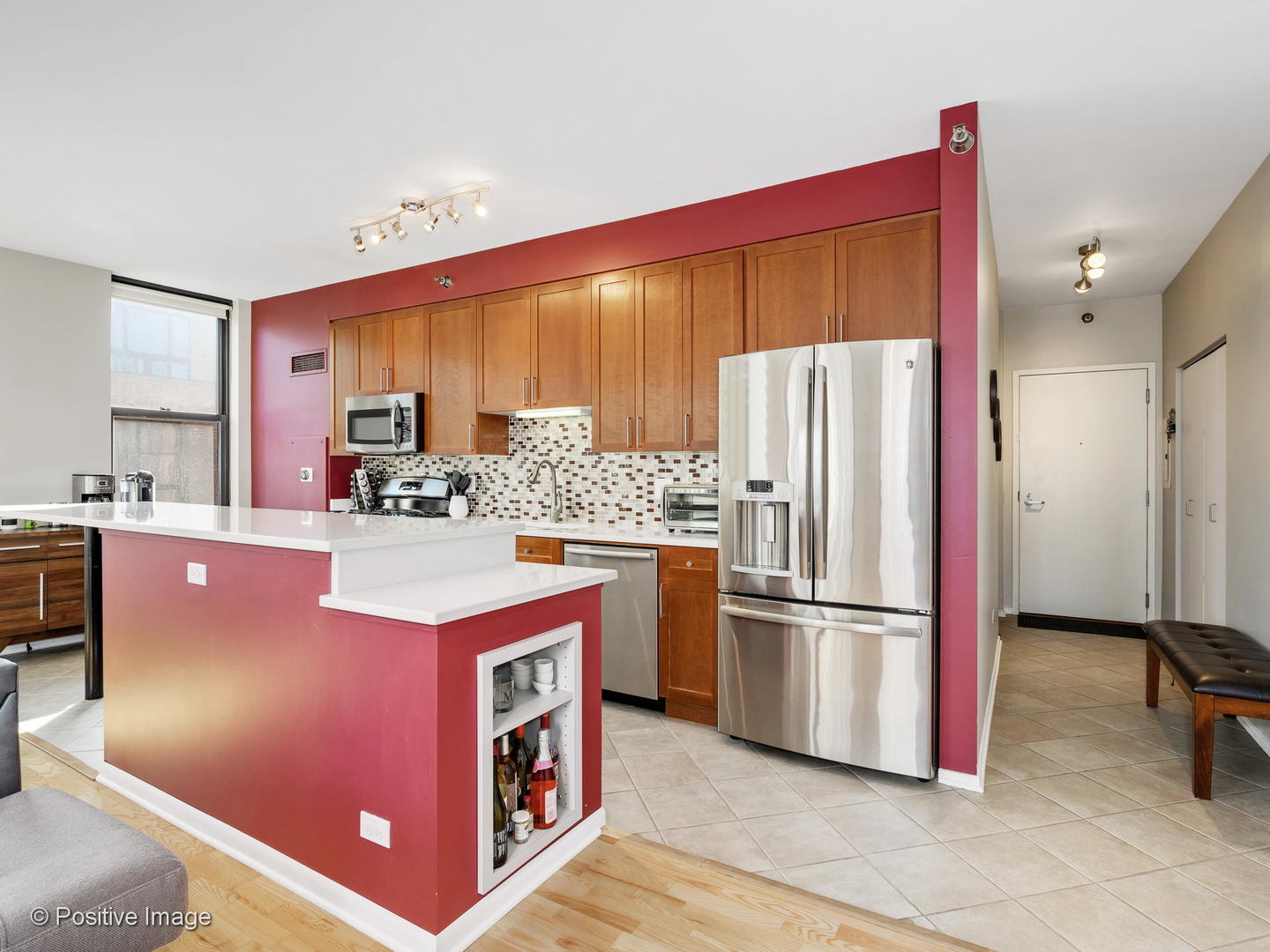 330 North Jefferson Street, Unit 904 Chicago, IL 60661 - Photo 15 of 27 a kitchen with stainless steel appliances granite countertop a refrigerator a stove and a refrigerator