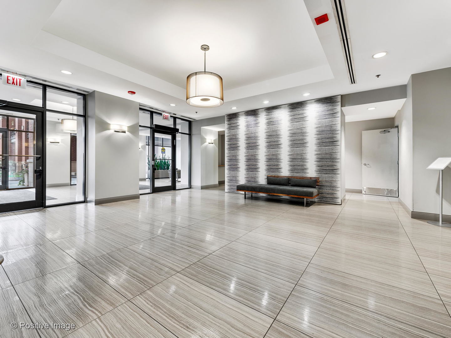 330 North Jefferson Street, Unit 904 Chicago, IL 60661 - Photo 25 of 27 a view of a livingroom with a staircase
