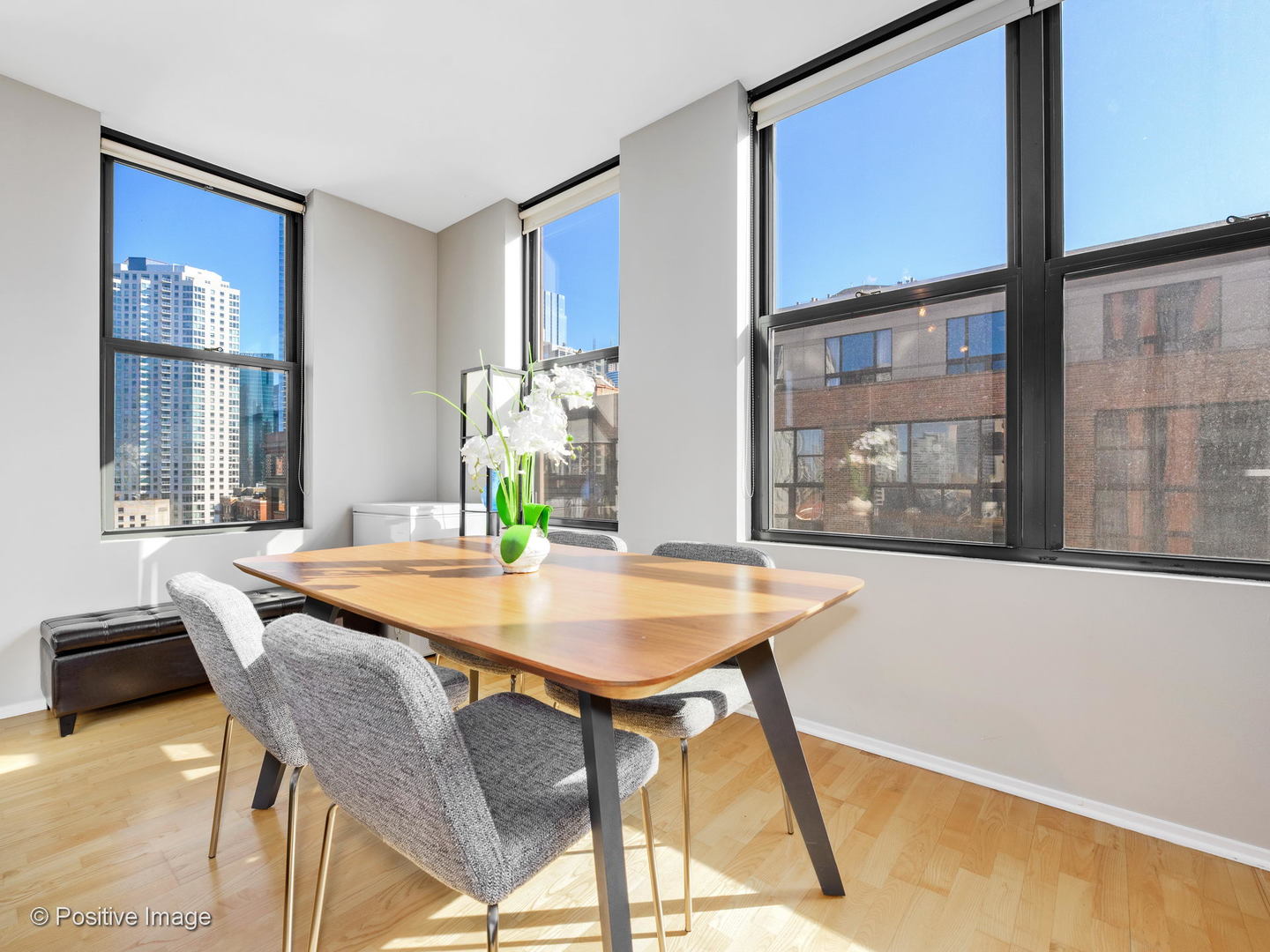 330 North Jefferson Street, Unit 904 Chicago, IL 60661 - Photo 10 of 27 a dining room with furniture and window