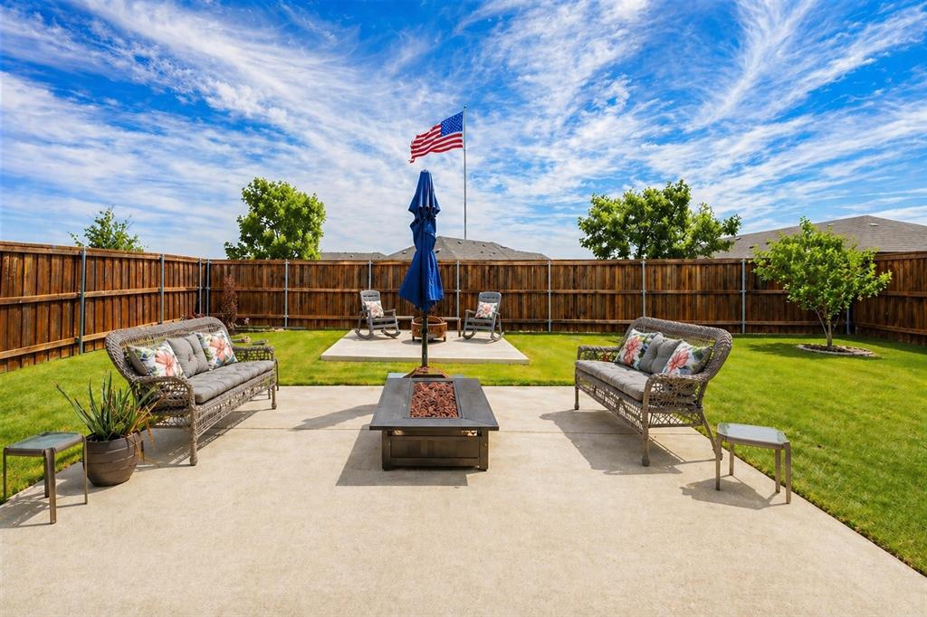 709 Bent Brook Road Oak Point, TX 75068 - Photo 4 of 24 Private, spacious, and HUGE upgrade having a board on board fence.