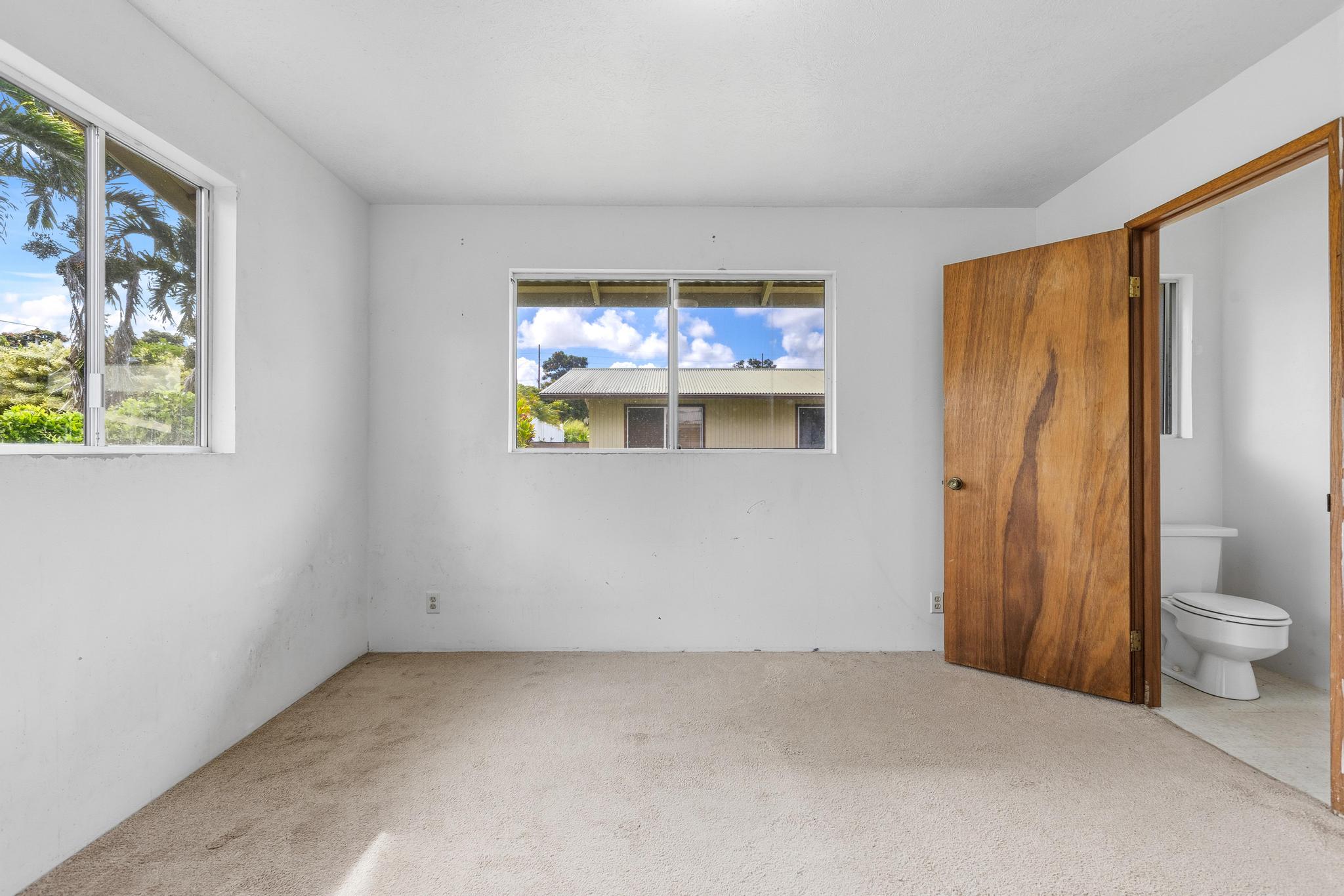 1560 Kilauea Avenue Hilo, HI 96720 - Photo 11 of 29 a view of an empty room with a window