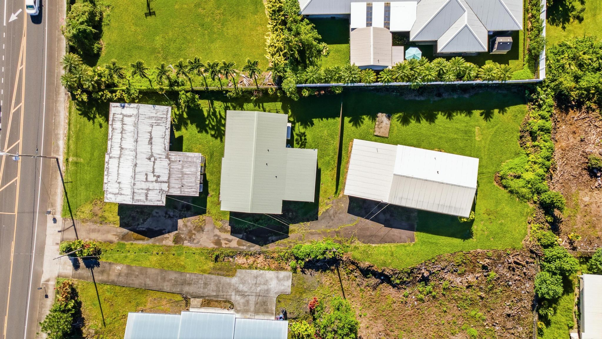 1560 Kilauea Avenue Hilo, HI 96720 - Photo 29 of 29 an aerial view of a house with a garden