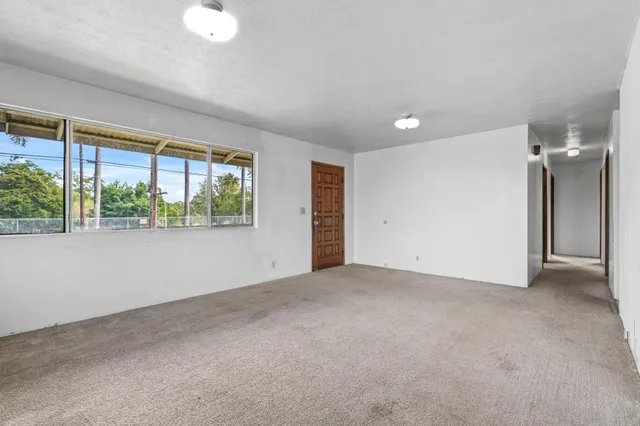 an empty room with windows