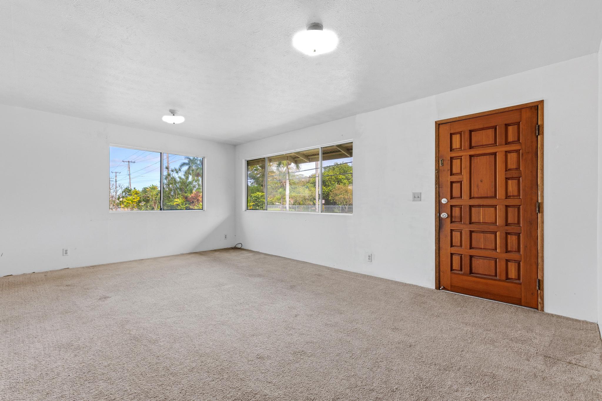 1560 Kilauea Avenue Hilo, HI 96720 - Photo 7 of 29 an empty room with windows