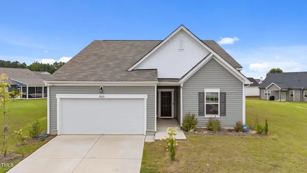 a view of a house with garage