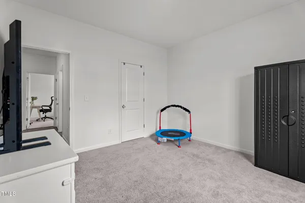 a view of living room with washer and dryer