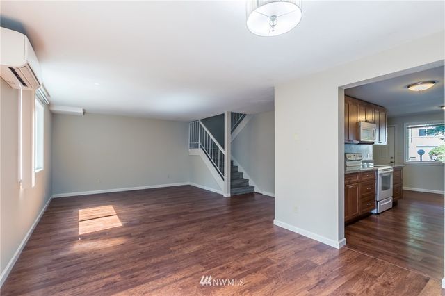 a view of entryway with wooden floor