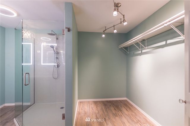 a bathroom with a sink double vanity and a mirror