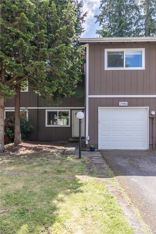 a kitchen with granite countertop stainless steel appliances and cabinets