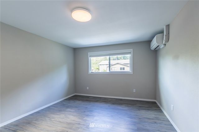 a view of deck with wooden floor and fence